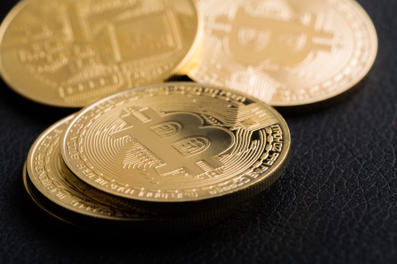 bitcoins-on-leather-background-2023-11-27-04-50-23-utc.jpg