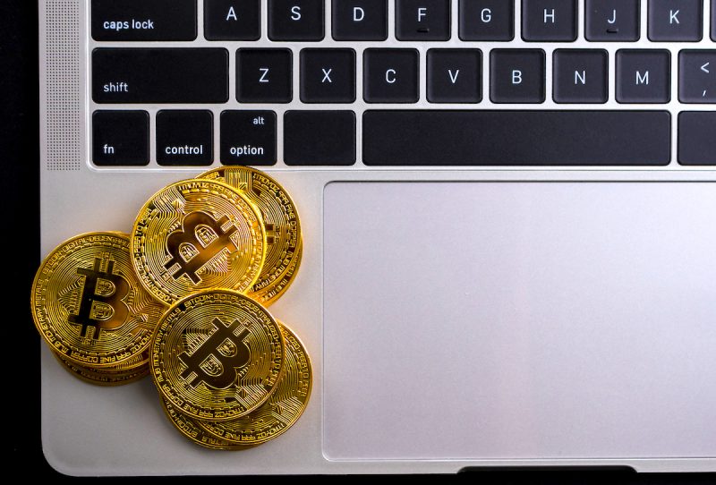 golden-coins-with-bitcoin-symbol-on-computer-2022-12-16-03-11-58-utc.jpg