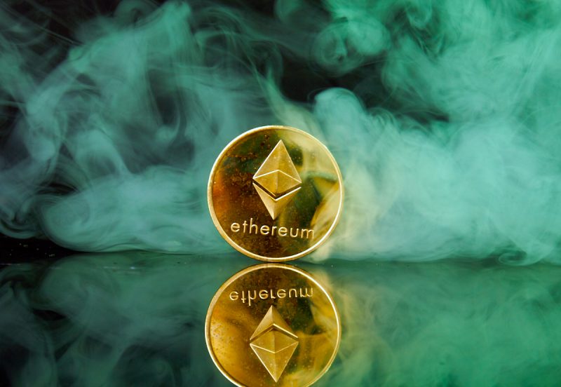 golden-ethereum-coin-on-the-smoke-background-2022-01-29-21-45-31-utc.jpg